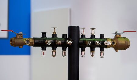 Automatic fire extinguishing system manufacture concept. Fire Sprinkler system, close-upの写真素材