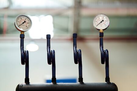 Pressure gauge psi meter on white  with copy space. Pressure meter gauge, close-upの写真素材