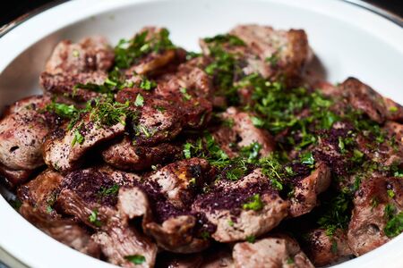 Barbeque party table with meat appetizer, shish kebab, shashlik, barbecue, close-up.Table in a restaurant with food snacks at an event, indoorsの写真素材