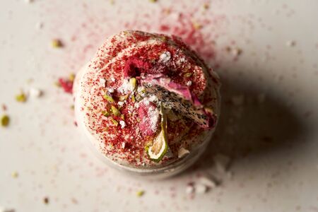 Meringue dessert Pavlova cake with fresh raspberries and whipped cream. French dessert. Muffin with...