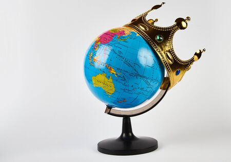 Coronavirus global quarantine. Coronavirus (2019-nCoV). World globe with medical face mask and corona isolated on white background with copy space.の写真素材