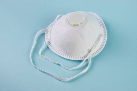 Safety breathing mask on blue