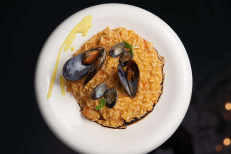 Fried cheese balls with nuts and spices. Snack cheese balls serving on decorative tray. Luxury restaurant food tableの写真素材