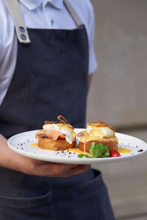 Healthy breakfast table with Crepes, blueberries, strawberry and yoghurt. Pancakes with fresh berries and jamの写真素材
