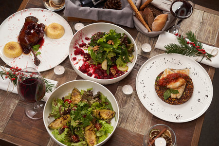 Christmas food table setting. Xmas and New Year dinner table with festive dishes