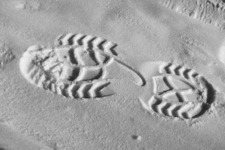 Footprints in fresh snow, close-up. Footsteps on the snow