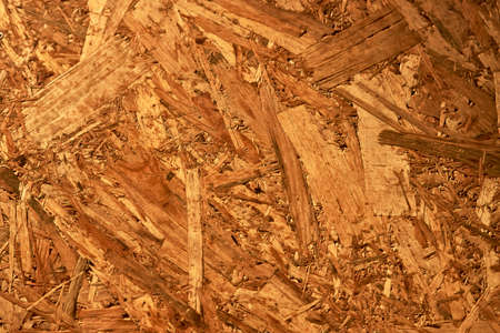 Oriented strand board texture, close-up. Wood board background, horizontalの写真素材