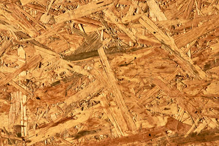 Oriented strand board texture, close-up. Wood board background, horizontal