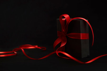 Black friday sale concept with gift box with ribbon, close-upの写真素材