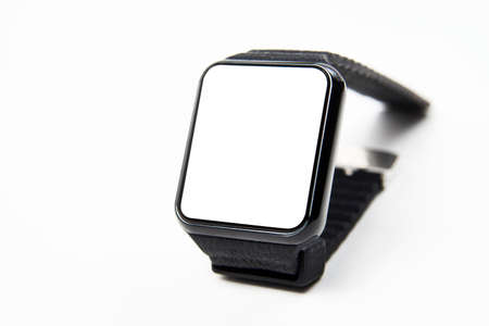 Wireless Smart Watch isolated on white background. Digital wrist watch with white display with copy space, close-upの写真素材