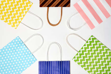 Colorful paper bag background. Paper shopping bag, shopping concept