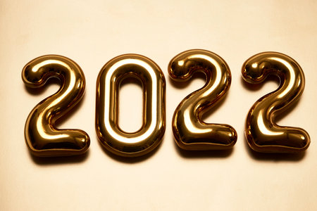 Happy New Year 2022 text number. Golden 2022 background with copy spaceの写真素材