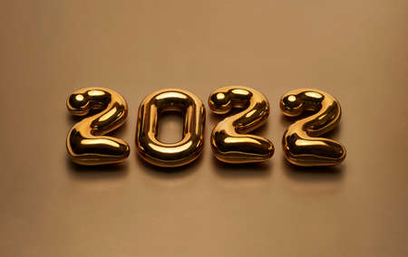 Happy New Year 2022 text number. Golden 2022 background with copy space