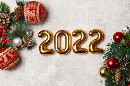2022 Christmas background with Christmas tree branch. 2022 New year frame