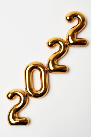 Happy New Year 2022 text number on white. Golden 2022 background with copy spaceの写真素材