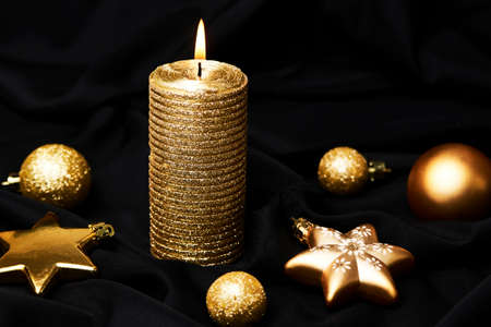 Christmas decoration candle and xmas toys. New Year and Christmas backgroundの写真素材