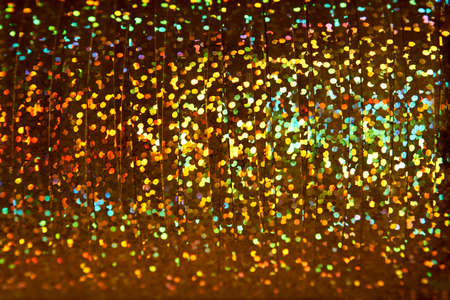 Colorful glitter background texture, top view, close-up
