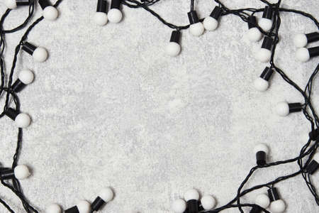 Christmas tree garland on gray background. Happy new year and Christmas decoration.