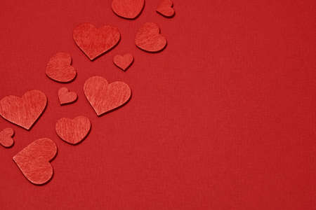 Valentines Day background with red hearts. Valentine day greeting card with copy space for textの写真素材