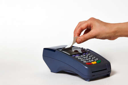 Credit card payment, buy and sell service. Woman hand with credit card and payment terminal on white...