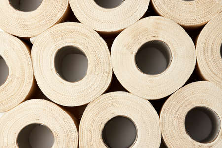 Toilet paper roll on a white background with copy space, close-up. Paper towel rollの写真素材