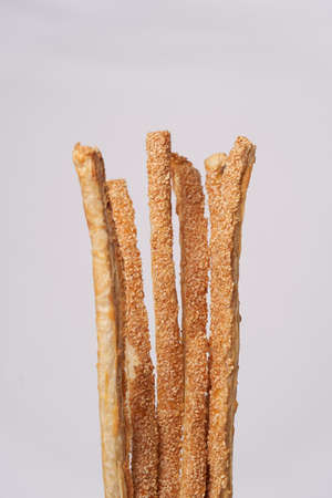 Italian grissini, salted bread sticks isolated on white background, close-up.の写真素材
