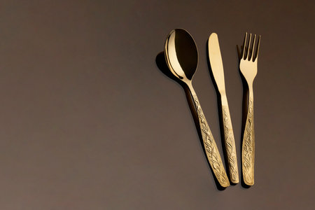 Fork, knife and spoon, kitchen cutlery on dark background, pathの写真素材