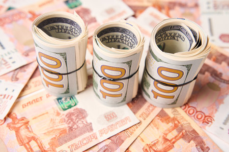 Dollar and Ruble money background. Russian ruble and American dollar bills. Currency money exchangeの写真素材