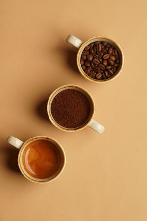 Various kinds of coffee cup. Set of different three coffee on beige background with copy spaceの写真素材