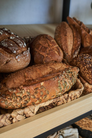 Assortment of fresh pastry on wooden shelf, close-up
