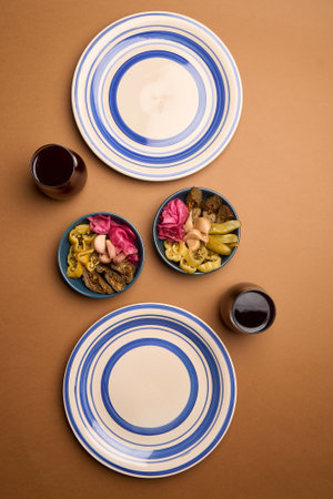 Traditional Azerbaijani khinkali with chopped meat, yogurt and pickles