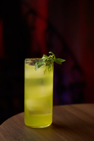 Classic cocktail glass table in night club restaurant. Alcohol cocktail drink, close-up. Modern alcoholic beverageの写真素材