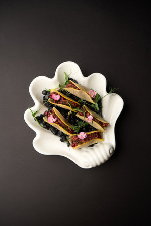 Healthy vegetable salad with pomegranate and quince. Vegetarian food