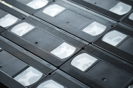 Video cassette tape isolated on white. Old analog tape VHS cassette, close-up. Retro and vintageの写真素材