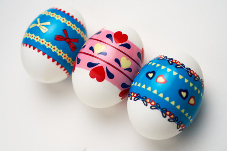 Colorful Easter eggs on a white background, close-upの写真素材
