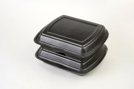 Disposable food container on a white background with copy space. Take Out Food Box or Styrofoam Containerの写真素材