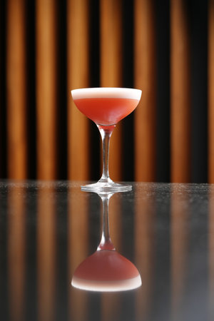 Clover Club Cocktail gin on a marble table, background with copy space