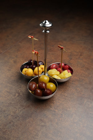 Pickled fruits and berries served as snackの写真素材