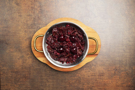 Sliced beef steak with cherry sauce baked in panの写真素材