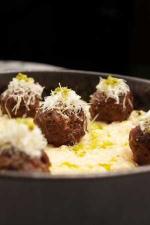Italian meatballs with cheese sauce.の写真素材