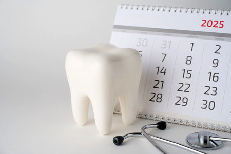Dentist appointment calendar on a white background with copy space. Reminder calendar for visiting...