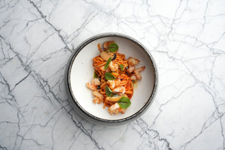 Pasta and tiger prawns in tomato sauce. Italian pasta with shrimpsの写真素材