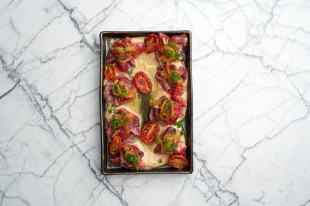 Baked tomatoes, onion and beef slices