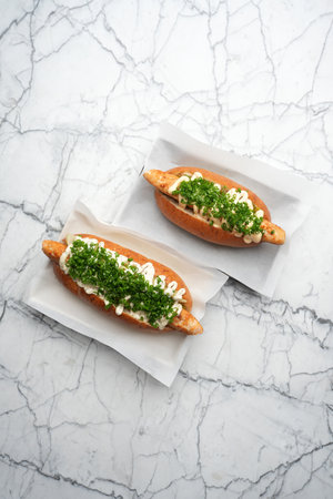 Hot dog with chicken sausage, green onion and sauce