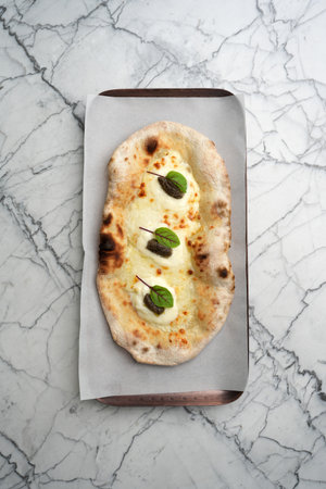 Pizza with truffle cheese, top viewの写真素材