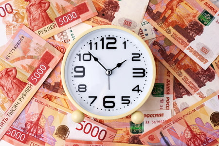Time is Money Concept with Clock and Russian Ruble Money Currencyの写真素材