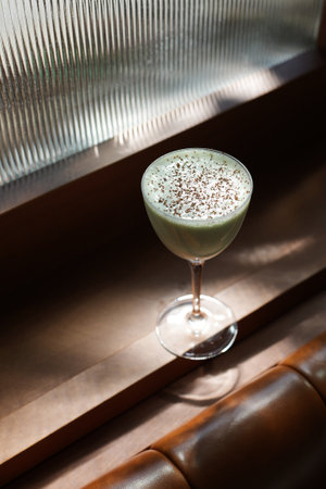 Light green cocktail in a martini glass, a variation of a Grasshopper or Alexander cocktailの写真素材
