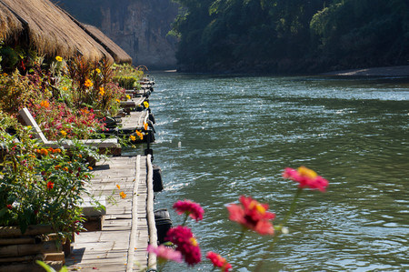 Floating Raft Hotel on the River Kwai in Thailand. Beautifully decorated with flowers.の写真素材