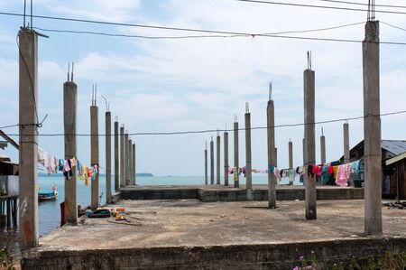 Clothes drying on concrete constructionの写真素材