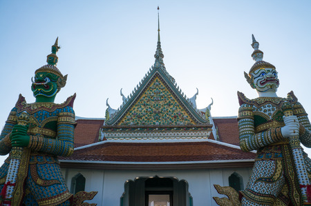 Demon (Giant or Yak) guardians at the Temple of Dawn (Wat Arun Ratchawararam Ratchawaramahawihan or Wat Arun), Bangkokの写真素材
